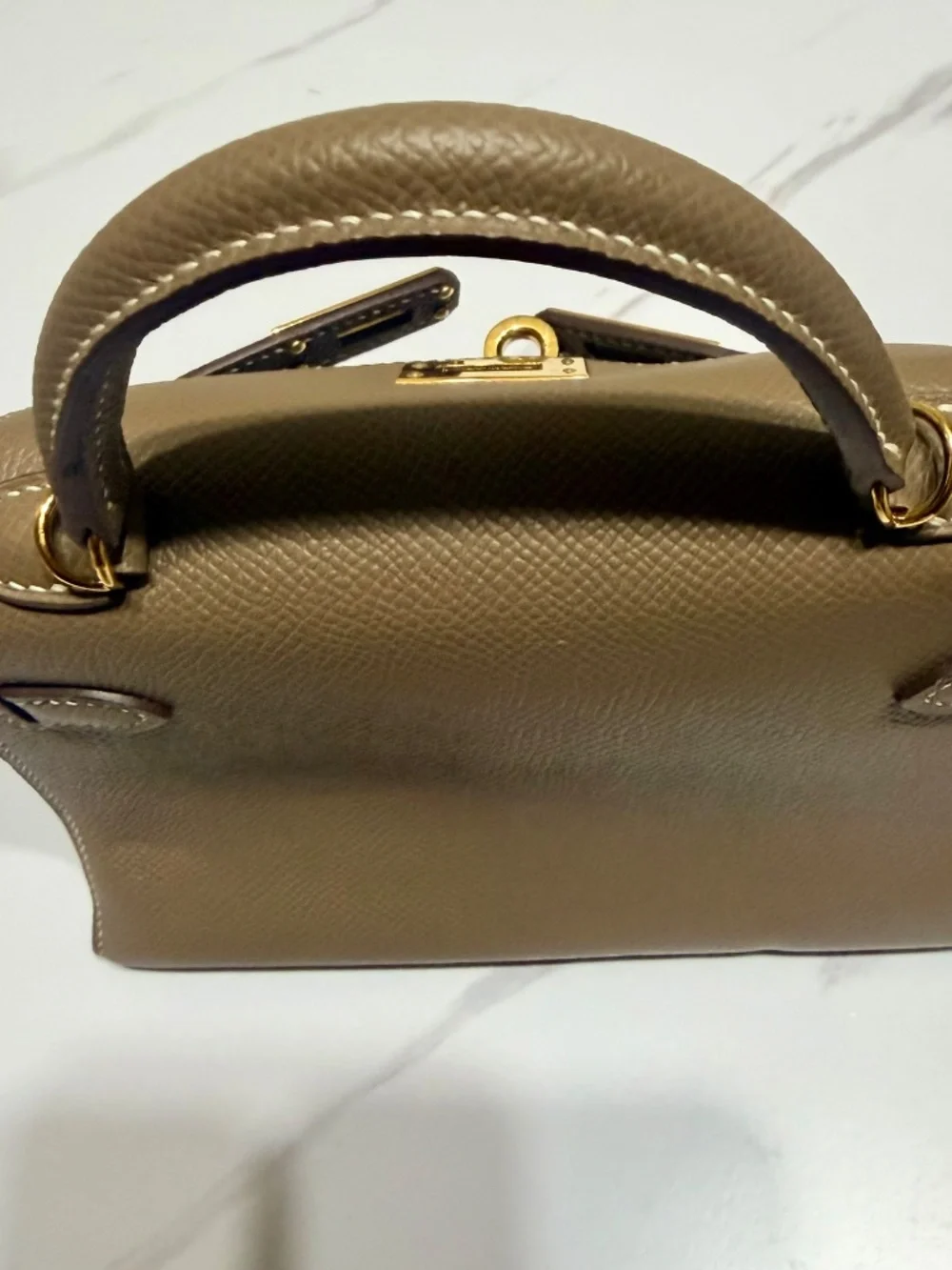 Mini top handle bag.. Kelly